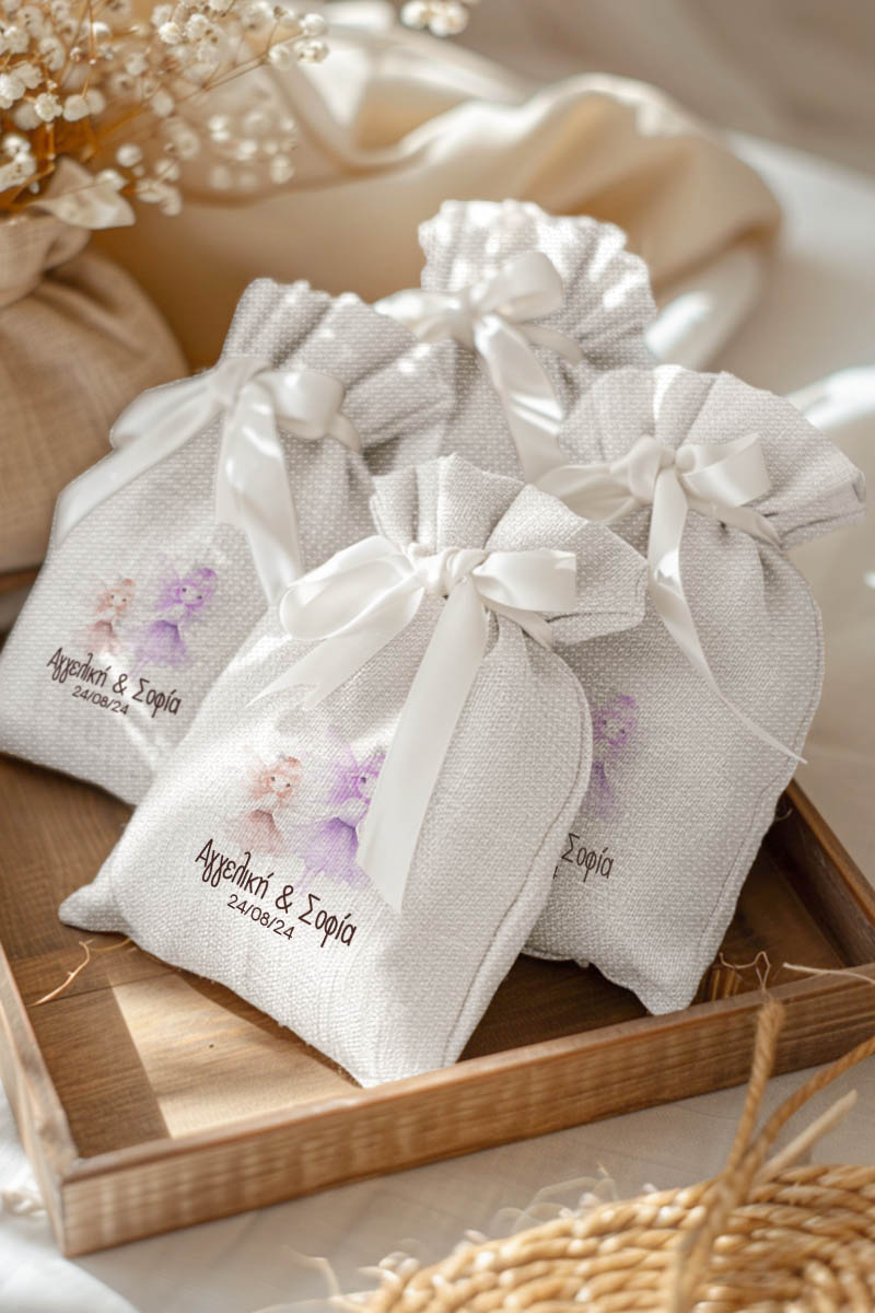 Μπομπονιέρες Βάπτισης Πουγκί σε Λευκό Χρώμα με Σχέδιο Δίδυμες Νεράιδες