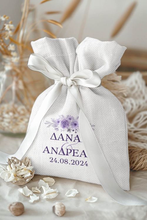 Μπομπονιέρες Γάμου Πουγκί σε Λευκό Χρώμα με Σχέδιο Μωβ Ανθισμένα Λουλούδια