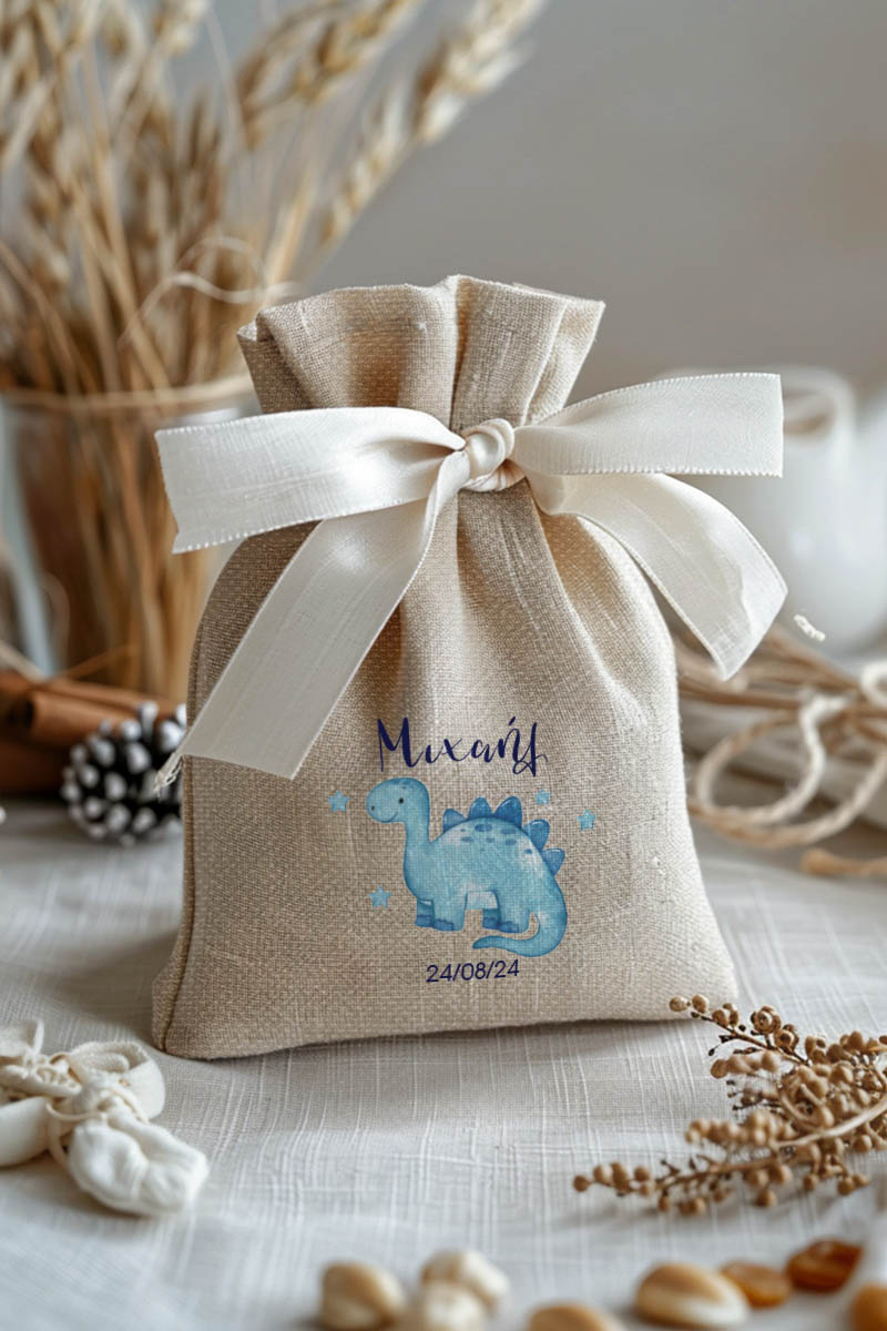 Μπομπονιέρες Βάπτισης Πουγκί σε Εκρού Χρώμα με Σχέδιο Δεινόσαυρος με Αστεράκια